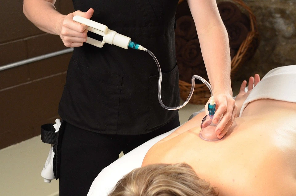 suction cups on back female patient