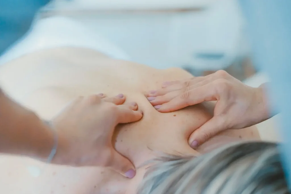 upper-back-massage-on-female-patient